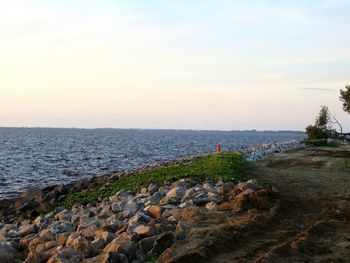 Scenic view of sea against sky during sunset