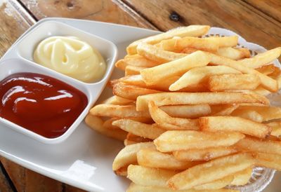High angle view of french fries in plate on table