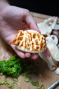 Close-up of hand holding food