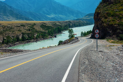 Road leading towards mountains