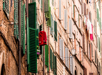 Low angle view of clothes hanging on building