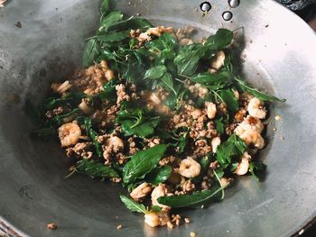 High angle view of chopped vegetables on leaves