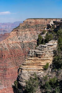 Rock formations on mountain against sky