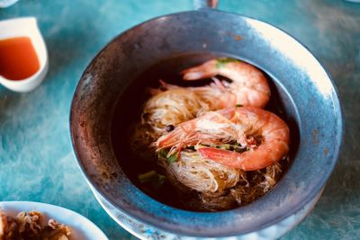 High angle view of shrimps in bowl on table