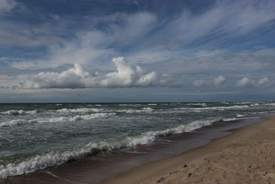 Scenic view of beach against sky