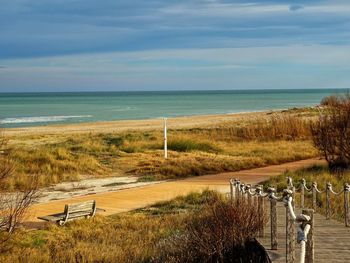Scenic view of beach against sky