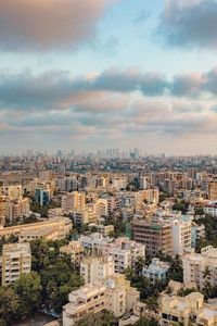 High angle view of buildings in city against sky