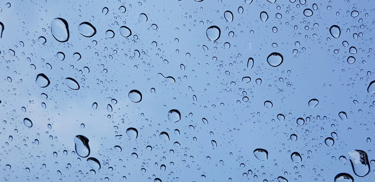 drop, water, wet, window, transparent, glass, no people, rain, close-up, backgrounds, full frame, nature, indoors, raindrop, black and white, pattern, purity, blue, sky, freshness, abstract