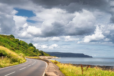 Winding road leading trough coastline, wild atlantic way