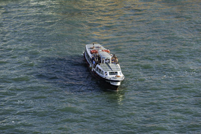 High angle view of boat sailing in sea