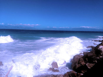 Waves splashing on rocks