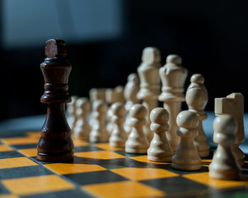 Close-up of chess pieces on board