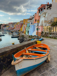 Boats moored at harbor