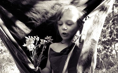 Portrait of girl with pink flowers