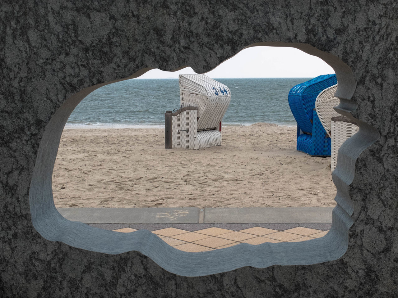 SCENIC VIEW OF BEACH AGAINST SKY SEEN THROUGH ARCH