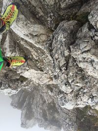 High angle view of text on rock