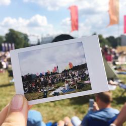 Close-up of hand holding instant photo