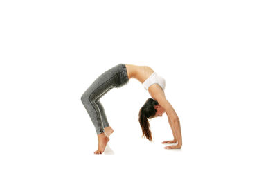 Side view of woman against white background