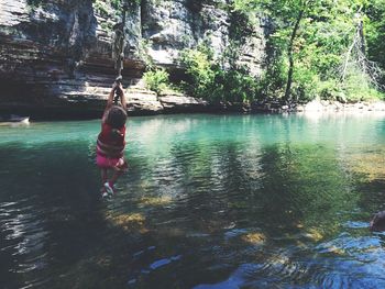 Woman standing in water