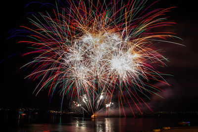 Firework display at night