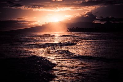 Scenic view of sea against sky during sunset