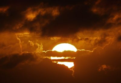 Low angle view of dramatic sky during sunset
