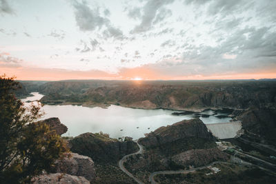 Scenic view of sea against sky during sunset