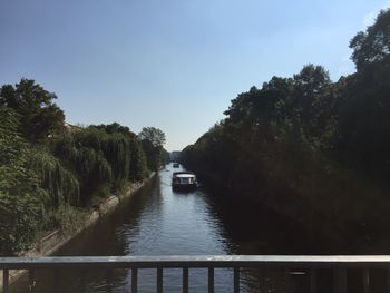 View of canal along trees