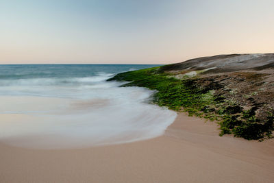 Scenic view of sea against clear sky