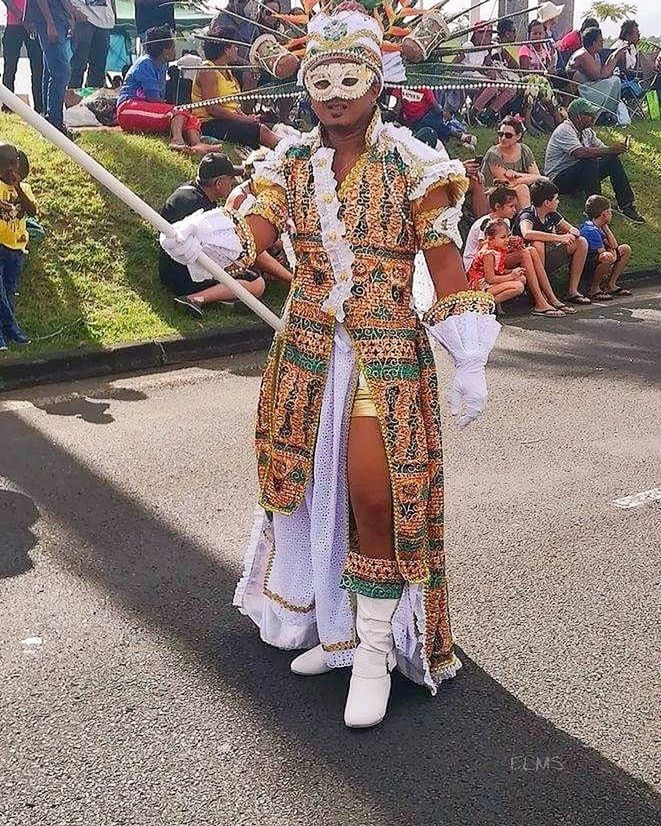 FULL LENGTH PORTRAIT OF TRADITIONAL CLOTHING STANDING OUTDOORS DURING FESTIVAL