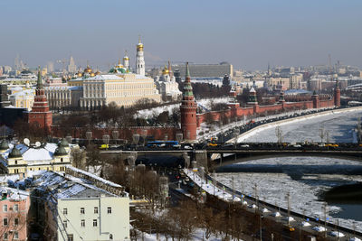 Cityscape against clear sky during winter