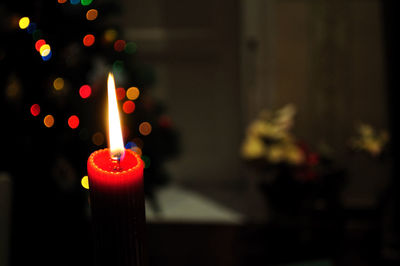 Defocused image of illuminated candles