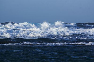 Scenic view of sea against clear sky