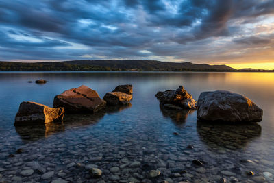 Sunset lake constance with stones