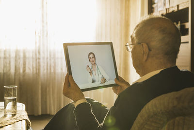 Portrait of man using mobile phone