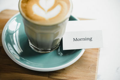 High angle view of coffee cup on table