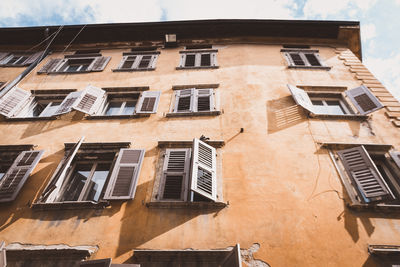 Low angle view of old building against sky