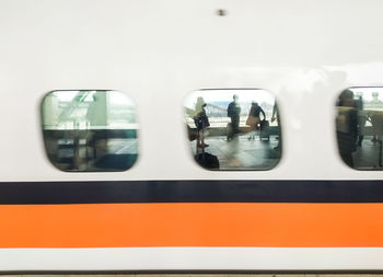 Blurred motion of train at railroad station