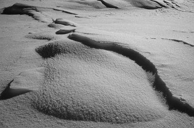 High angle view of sand at beach