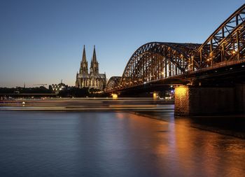 View of bridge over river in city