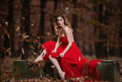 Portrait of young woman in forest