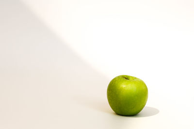 Close-up of apple against white background