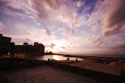 Scenic view of sea against dramatic sky