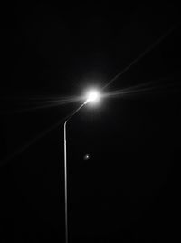 Low angle view of illuminated street light