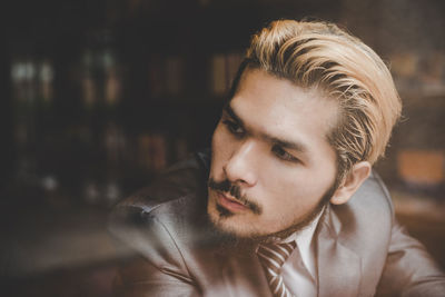 Close-up of businessman looking away