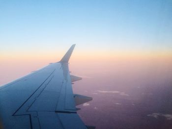 Cropped image of airplane wing