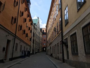 Narrow alley along buildings