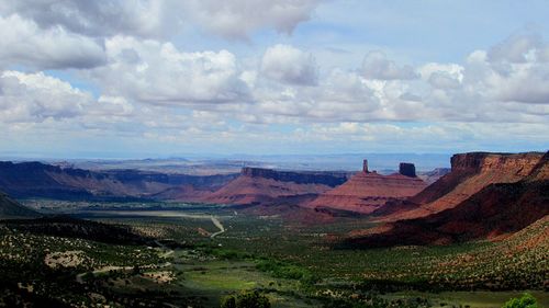 Scenic view of dramatic landscape against cloudy sky