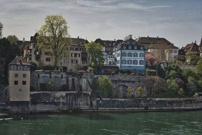 Beautiful architecture of basel, switzerland, at the river rhine on a sunny day