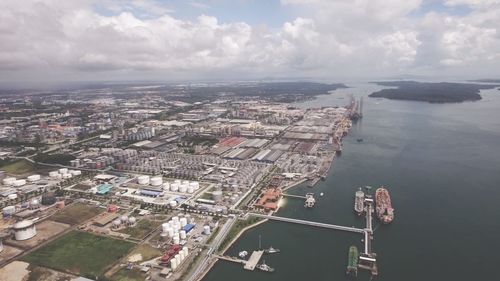 Aerial view of cityscape against sky